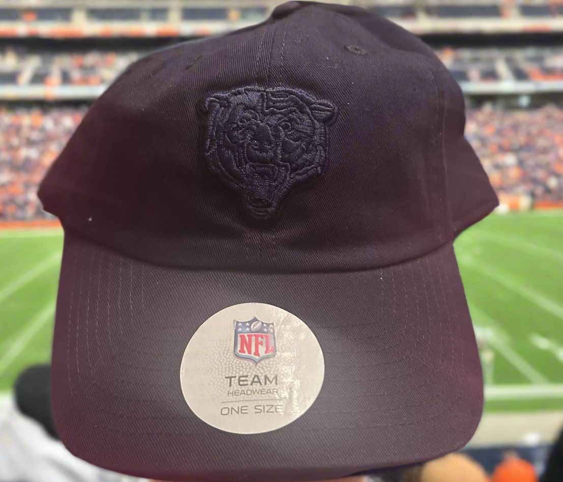 Navy blue cap with a logo and NFL label on a stadium background