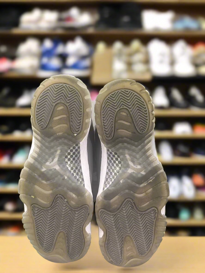 Brown shoes with tread pattern on a green background