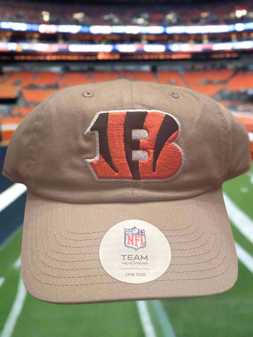 Beige cap with NFL logo and Cincinnati Bengals logo on a sports field background