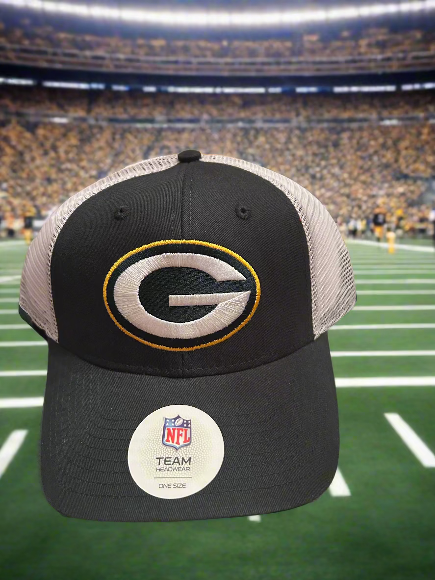Collection of sports team caps including Green Bay Packers, Chargers, and Jaguars on a textured surface.